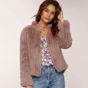 Cute taupe/tan (called “mist” on heartloom the website) faux fur jacket
